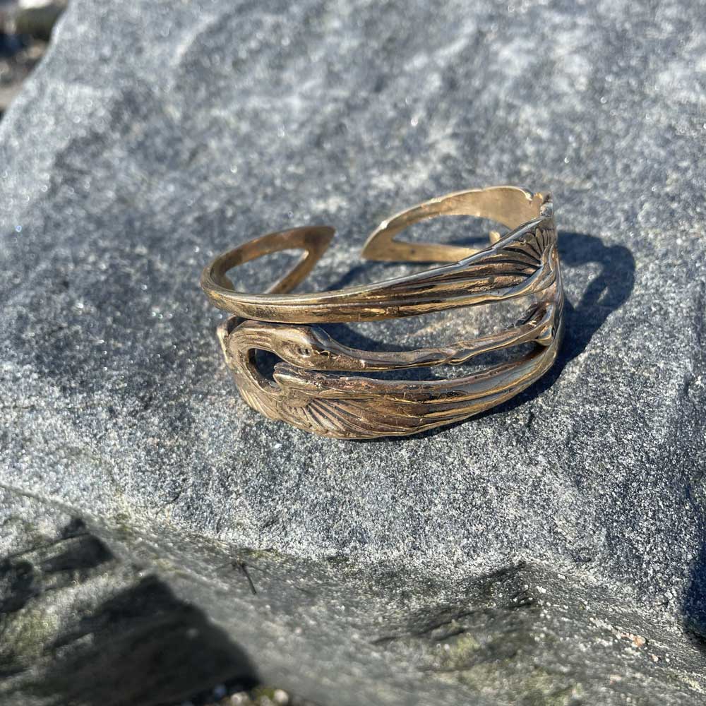 Svane armsmykke i bronze