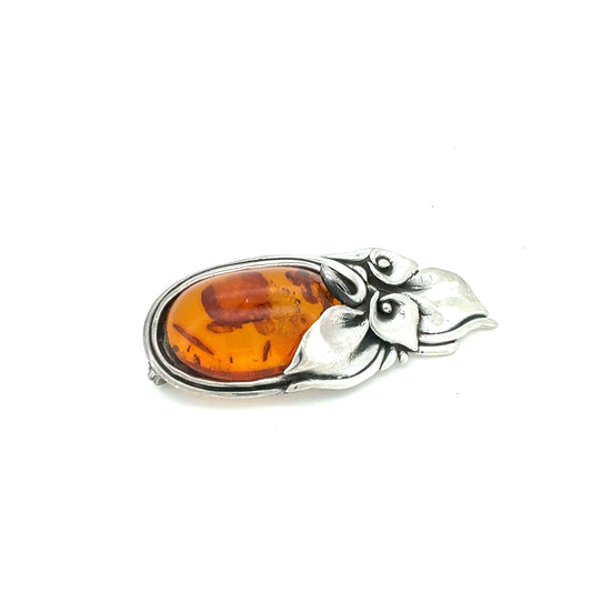 Broche m/rav og sølvliljer